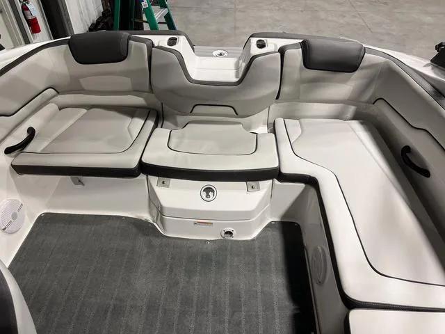 Slide: The Image of 2025 Yamaha Boats AR190 interior seating with gray and black upholstery. - 6