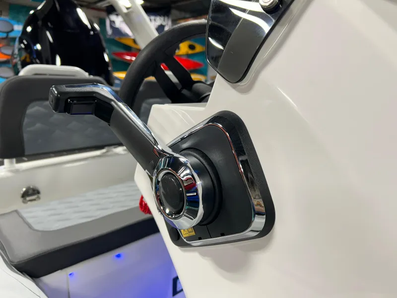 Slide: The Image of Close-up of 2025 Highfield Sport 420 boat throttle control in cockpit. - 18