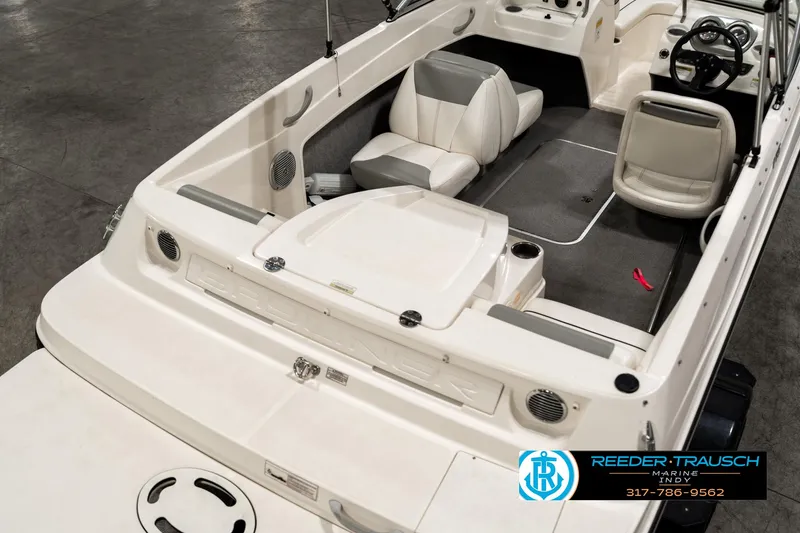Slide: The Image of 2013 Bayliner 175 boat interior with seating and steering wheel. - 10