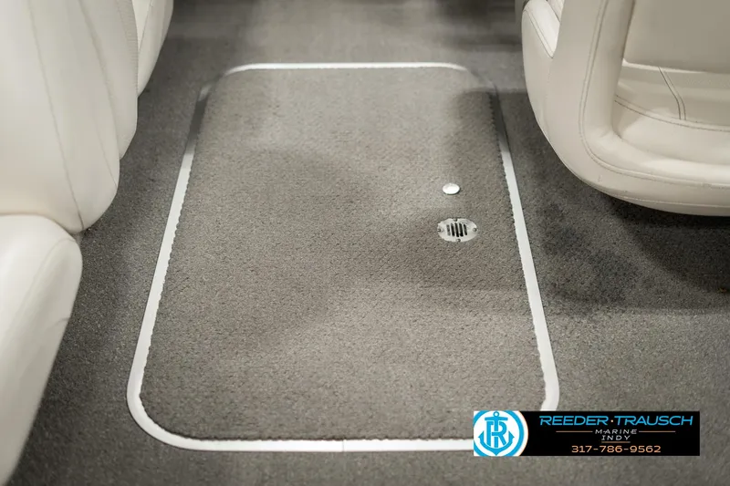 Slide: The Image of Interior of 2013 Bayliner 175 boat with carpeted flooring and seating. - 19