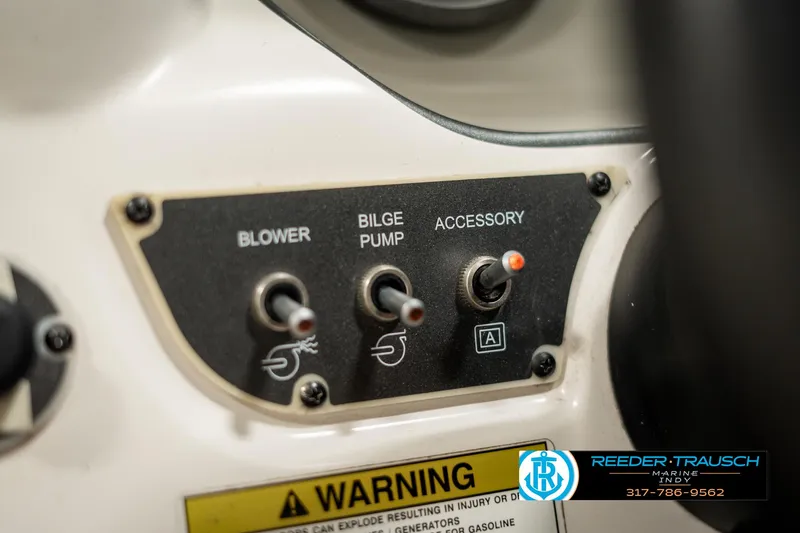 Slide: The Image of Control panel of a 2013 Bayliner 175 boat with switches for blower, bilge pump, and accessory. - 26
