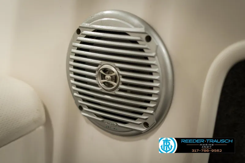 Slide: The Image of Close-up of a speaker on a 2013 Bayliner 175 boat interior. - 35