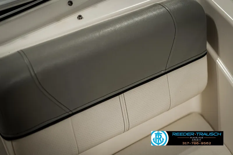 Slide: The Image of 2013 Bayliner 175 boat seat detail with gray and white upholstery. - 36