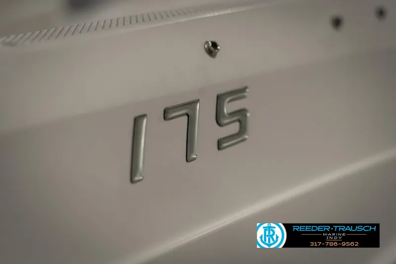 Slide: The Image of Close-up of 2013 Bayliner 175 boat model number with Reeder-Trausch Marine logo. - 37