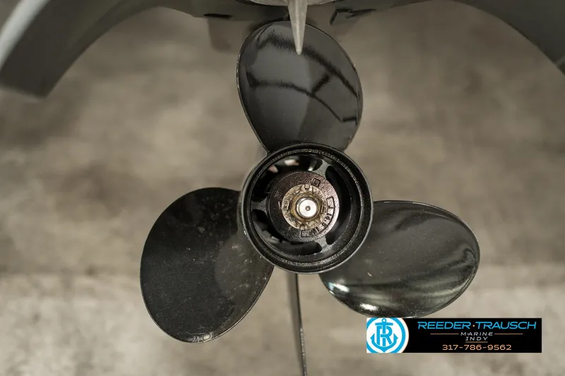 Slide: The Image of Close-up of a 2013 Bayliner 175 boat propeller, showcasing three blades. - 41