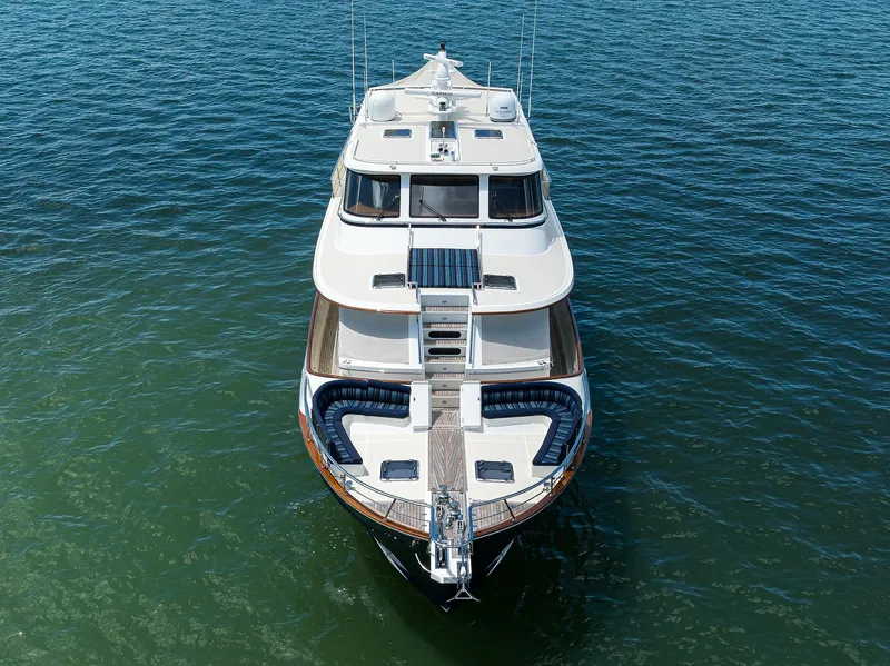 Slide: The Image of Luxury 2011 Marlow 97 Explorer yacht on open water, aerial view. - 7