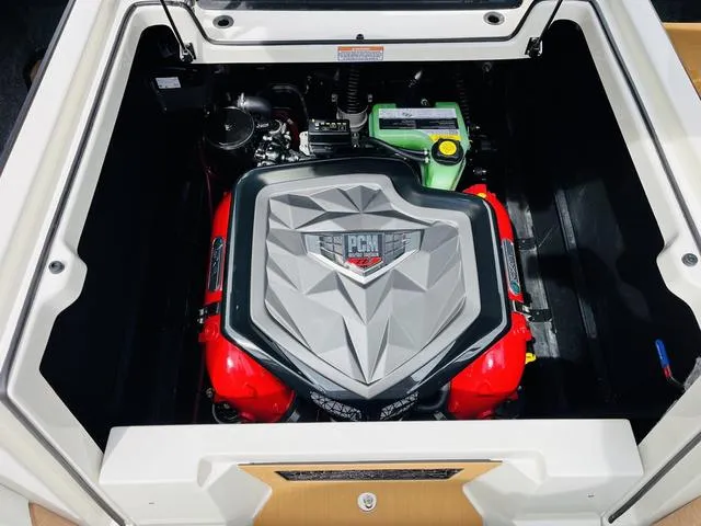 Slide: The Image of 2025 Nautique SUPER AIR G G25 engine compartment with PCM engine. - 37
