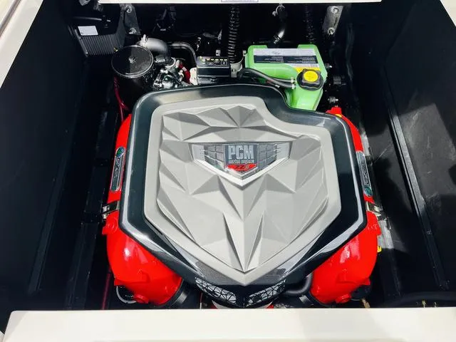 Slide: The Image of 2025 Nautique SUPER AIR G G25 engine, PCM cover, vibrant red accents. - 38