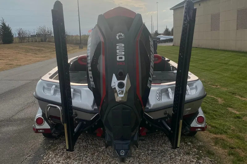 Slide: The Image of 2015 Ranger Z520C boat with Evinrude engine, parked outdoors. - 6