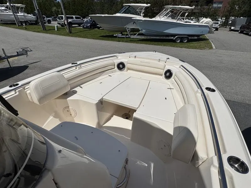 Slide: The Image of 2025 Grady-White Fisherman 216 boat interior with seating and storage compartments. - 2