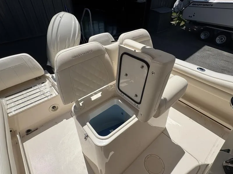 Slide: The Image of 2025 Grady-White Fisherman 216 boat interior with open storage compartment. - 6