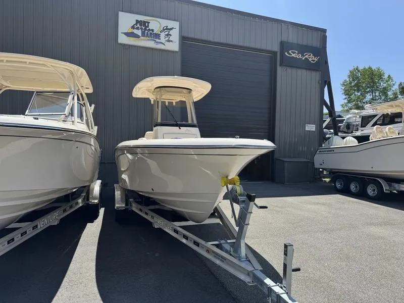 Slide: The Image of 2025 Grady-White Fisherman 216 boat on trailer at dealership. - 7