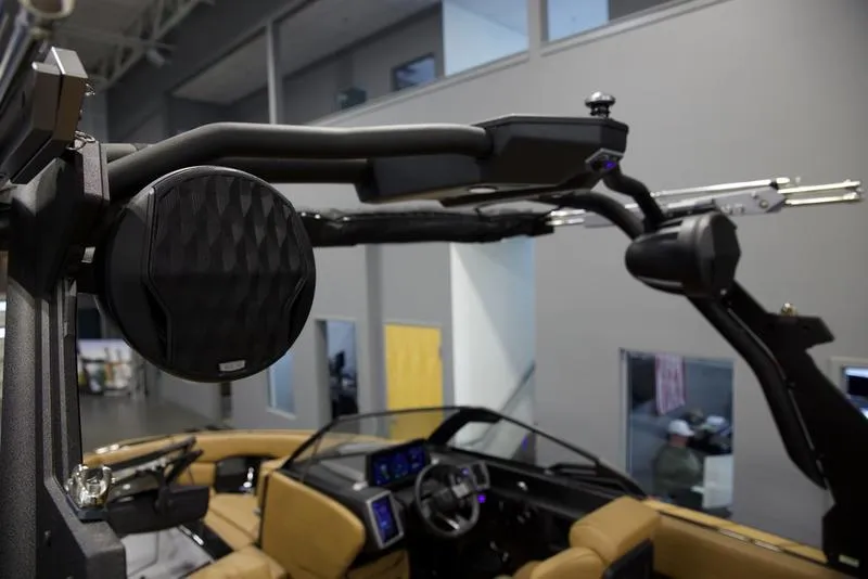 Slide: The Image of 2024 Malibu 23 LSV boat interior with advanced audio system and sleek design. - 3