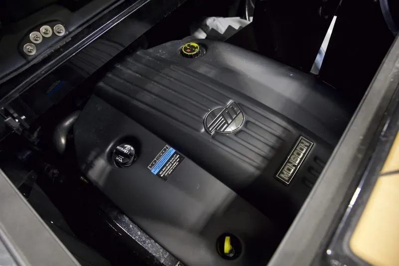 Slide: The Image of 2024 Malibu 23 LSV engine compartment, showcasing powerful marine engine design. - 8