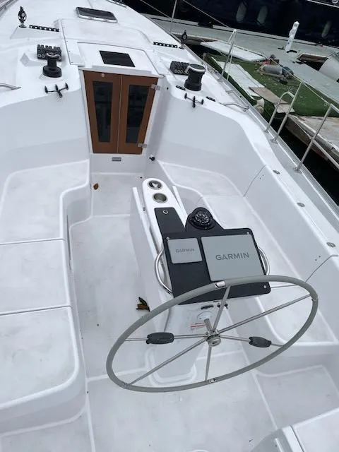 Slide: The Image of 2025 Catalina 386 sailboat cockpit with Garmin navigation system and dual helm. - 4