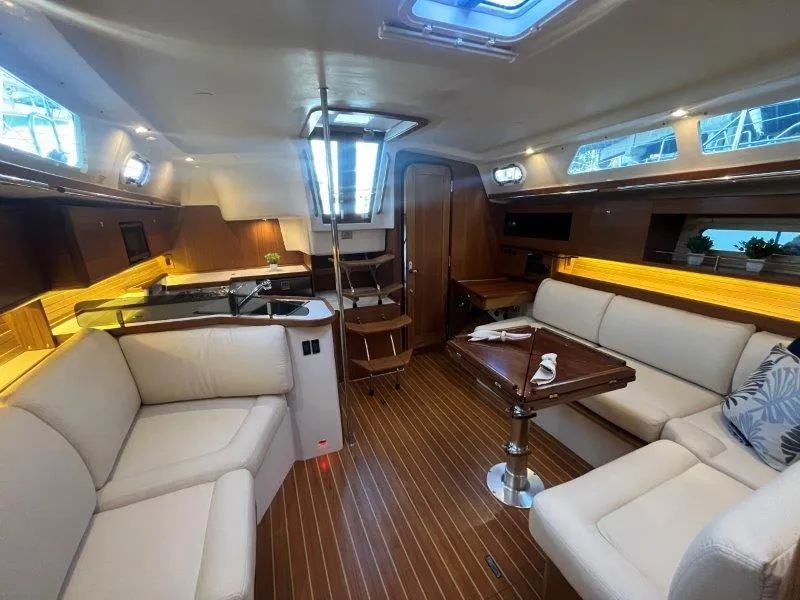 Slide: The Image of Luxurious interior of 2025 Catalina 386 yacht with elegant seating and wooden flooring. - 49