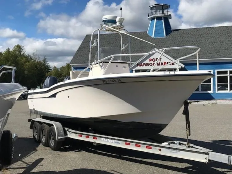 Slide: The Image of 2021 Grady-White 257 Fisherman boat on trailer at marina. - 0