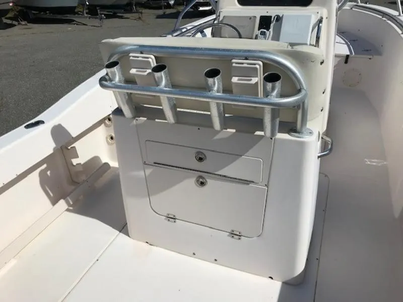 Slide: The Image of 2021 Grady-White 257 Fisherman boat interior with rod holders and storage compartments. - 10