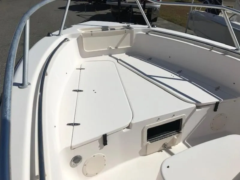 Slide: The Image of 2021 Grady-White 257 Fisherman boat interior with seating and storage compartments. - 15