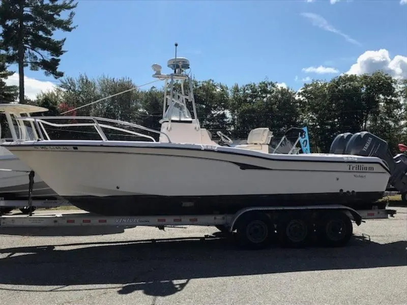 Slide: The Image of 2021 Grady-White 257 Fisherman boat on trailer, parked outdoors. - 3