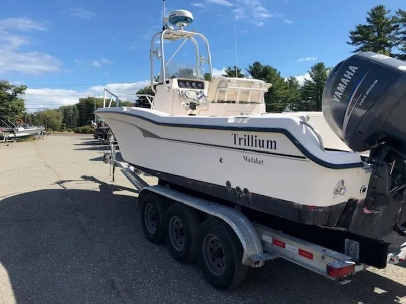 Slide: The Image of 2021 Grady-White 257 Fisherman boat on trailer, Yamaha engine, outdoors. - 4