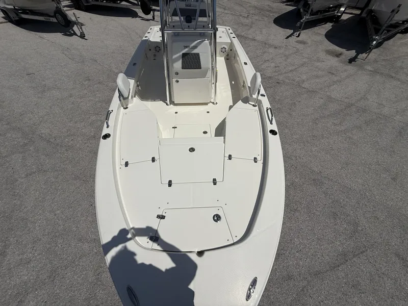 Slide: The Image of 2025 Pathfinder 2200 TRS boat, top view, showcasing deck layout and storage compartments. - 13