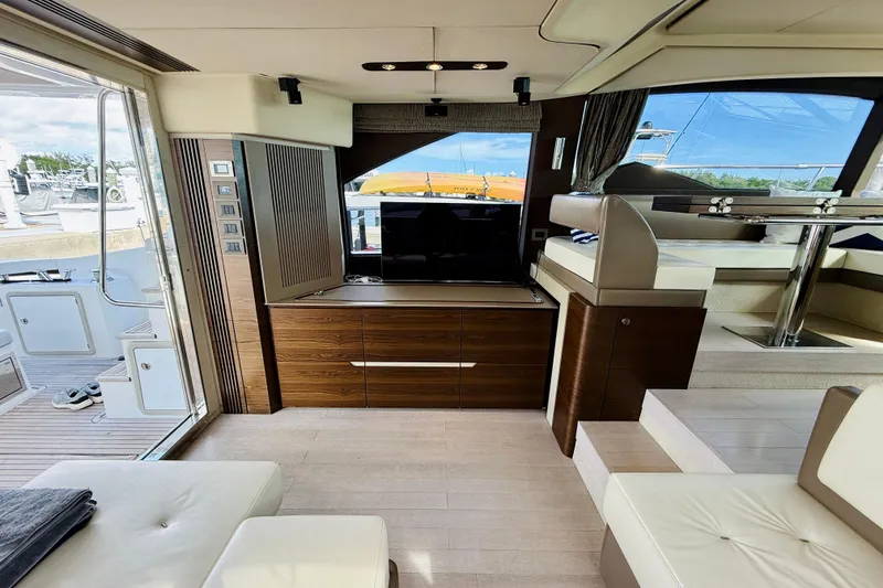Slide: The Image of Luxurious interior of 2015 Azimut 50 yacht with modern furnishings and large windows. - 37