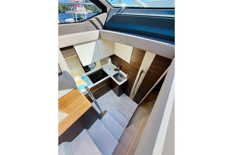 Slide: The Image of Luxurious interior of 2015 Azimut 50 yacht, featuring modern kitchen design. - 45