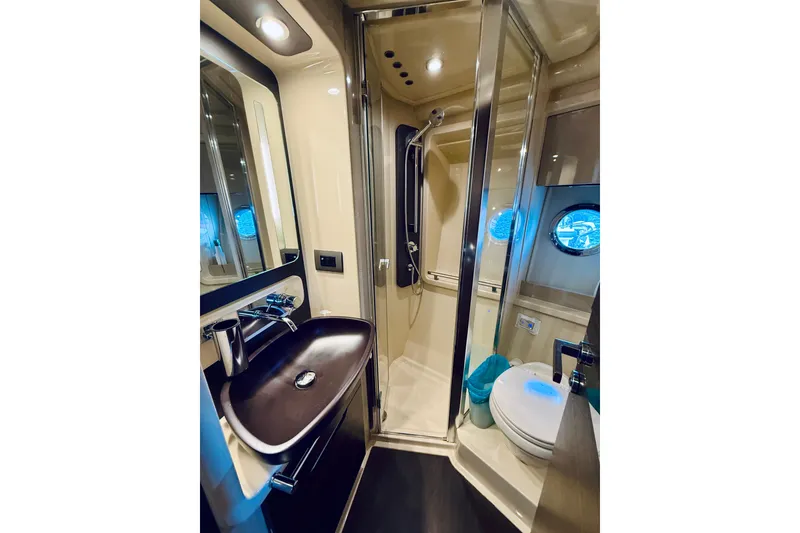 Slide: The Image of Luxurious bathroom in 2015 Azimut 50 yacht with modern fixtures and elegant design. - 64