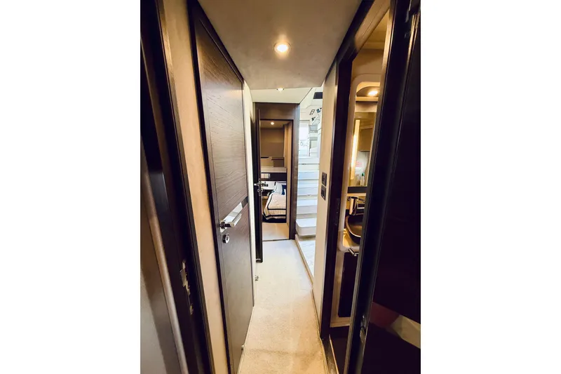 Slide: The Image of Interior hallway of 2015 Azimut 50 yacht, featuring modern design and wood finishes. - 65