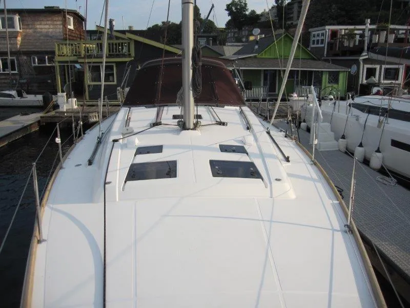 Slide: The Image of Beneteau Oceanis 45 sailboat deck, docked at marina, 2015 model. - 42