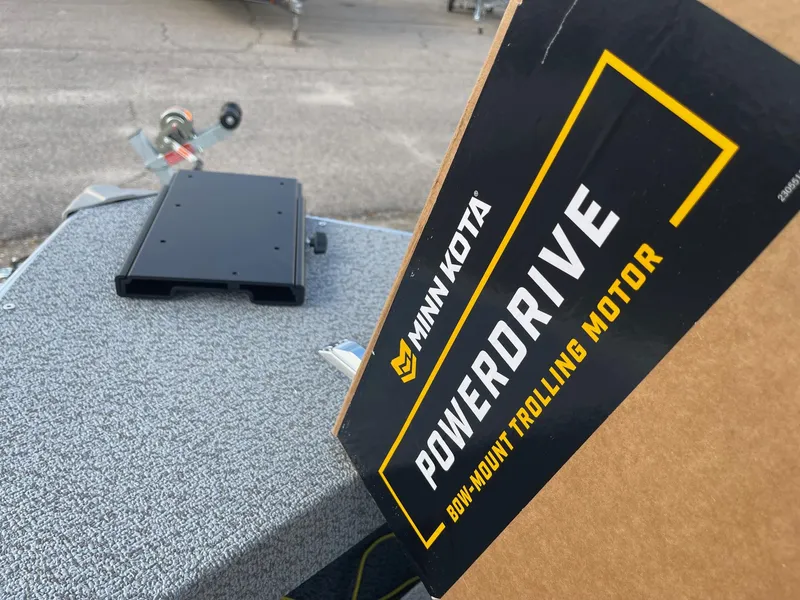 Slide: The Image of Minn Kota PowerDrive trolling motor box on Lund 1400 Fury SS, 2025 model. - 18