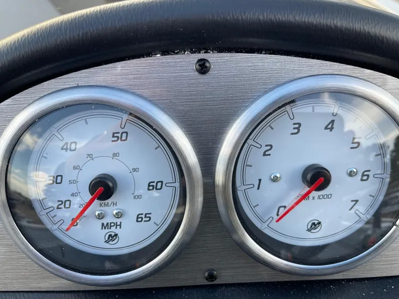 Slide: The Image of Dashboard of 2025 Lund 1400 Fury SS with speedometer and tachometer. - 7