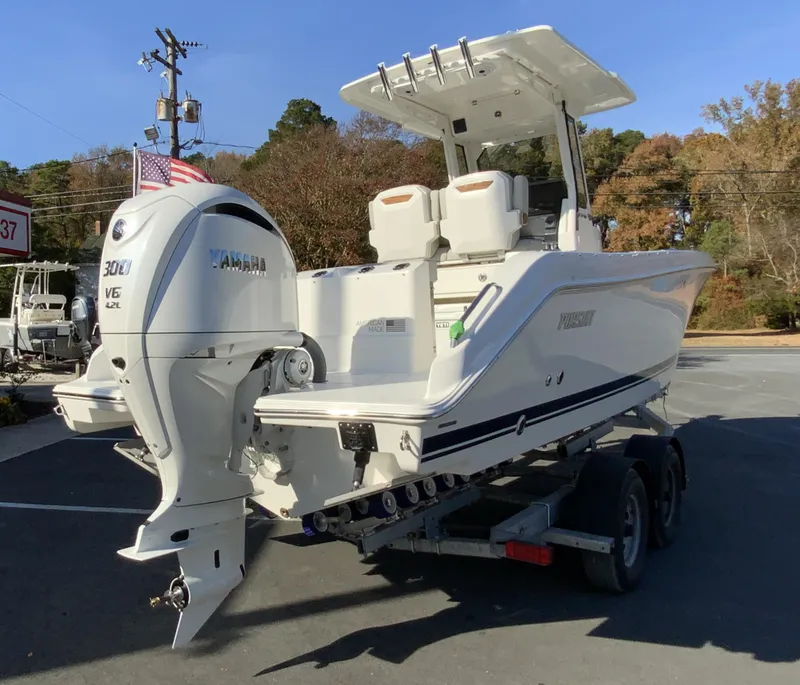Slide: The Image of 2025 Pursuit S 248 Sport boat on trailer with Yamaha V6 engine. - 7