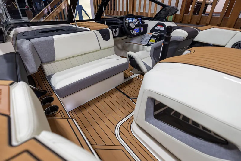 Slide: The Image of 2024 Nautique Ski Nautique interior with modern design, featuring plush seating and advanced controls. - 10