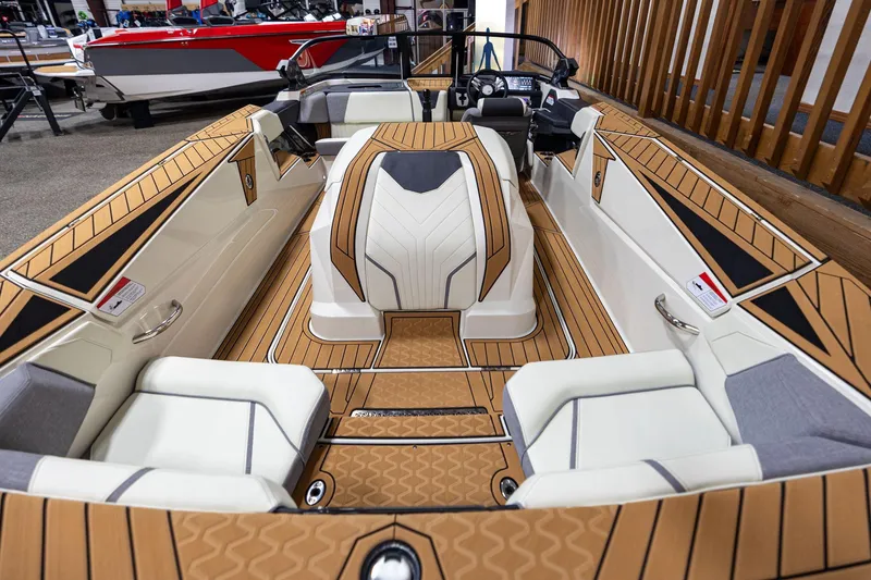 Slide: The Image of 2024 Nautique Ski Nautique boat interior with stylish seating and modern design. - 3
