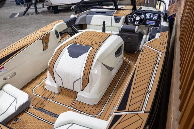 Slide: The Image of 2024 Nautique Ski Nautique interior with sleek design and modern dashboard. - 6