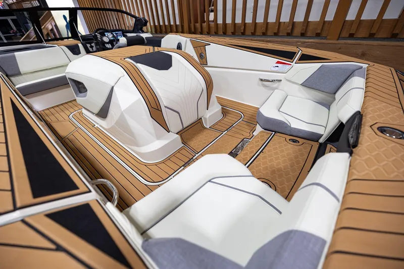 Slide: The Image of 2024 Nautique Ski Nautique interior with luxurious seating and modern design. - 7