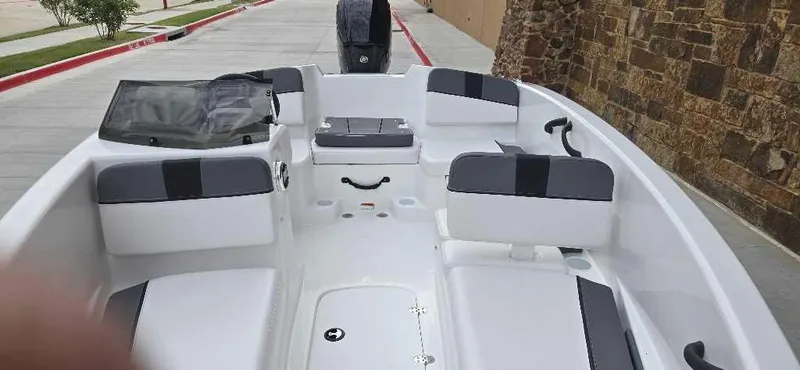 Slide: The Image of 2025 Tahoe T16 boat interior with seating and storage compartments. - 5