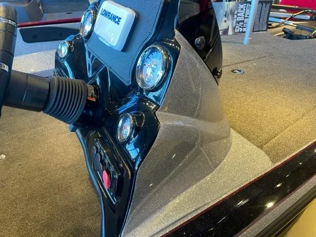 Slide: The Image of Nitro Z17 2025 boat dashboard with Lowrance electronics and steering wheel. - 4