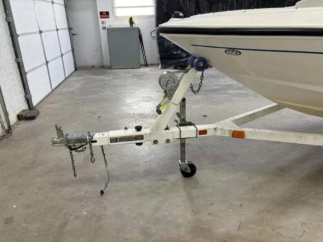 Slide: The Image of 2007 Bayliner 175 Bowrider on trailer in garage. - 13