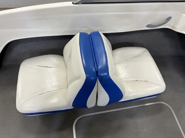 Slide: The Image of 2007 Bayliner 175 Bowrider white and blue boat seats. - 21