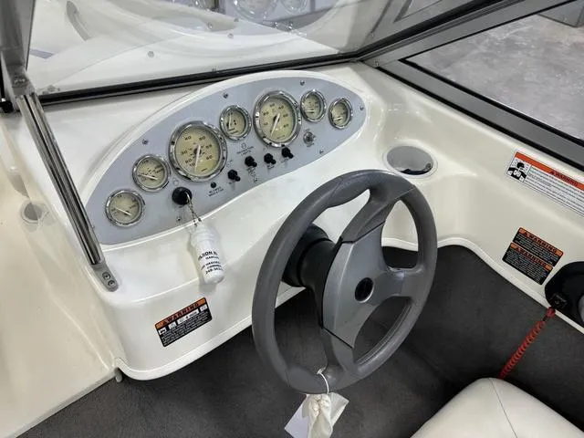 Slide: The Image of 2007 Bayliner 175 Bowrider dashboard with steering wheel and instrument panel. - 25
