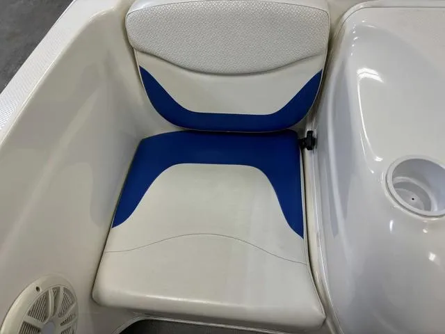 Slide: The Image of 2007 Bayliner 175 Bowrider seat with blue and white upholstery. - 31