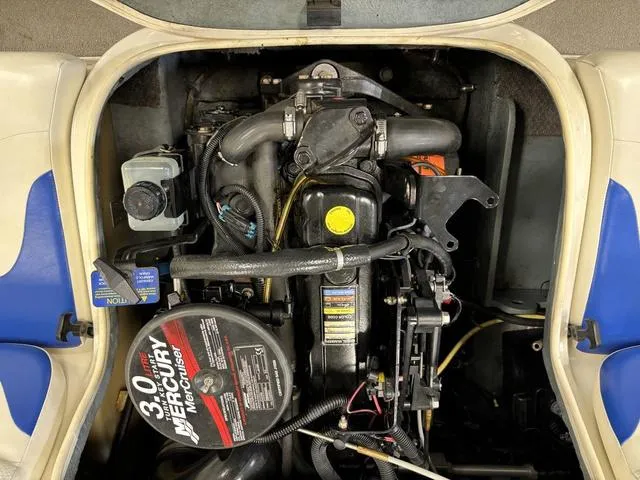 Slide: The Image of 2007 Bayliner 175 Bowrider engine compartment with Mercury 3.0L motor. - 33