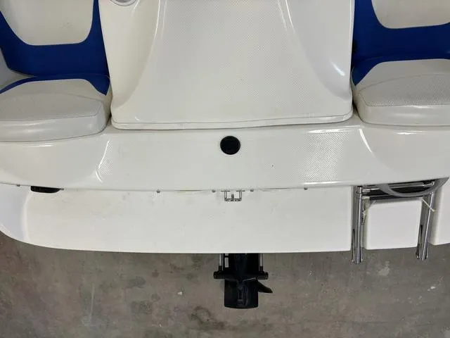 Slide: The Image of 2007 Bayliner 175 Bowrider boat interior with white and blue seating. - 34