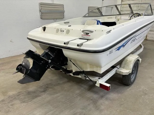 Slide: The Image of 2007 Bayliner 175 Bowrider on trailer, displayed indoors, rear view. - 7