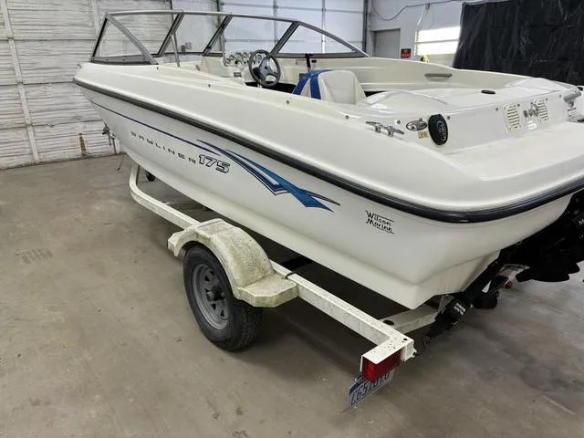 Slide: The Image of 2007 Bayliner 175 Bowrider on trailer in garage setting. - 9