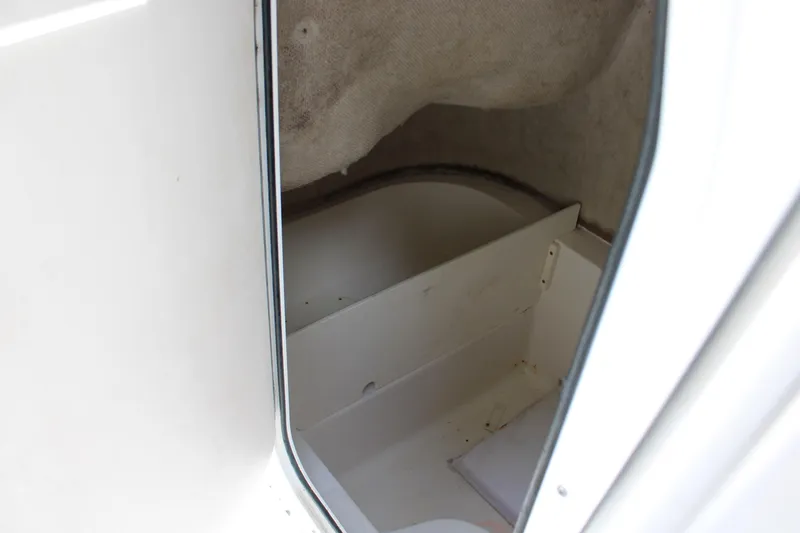 Slide: The Image of Interior storage compartment of 2009 Sea Fox 256CC Pro Series boat. - 16