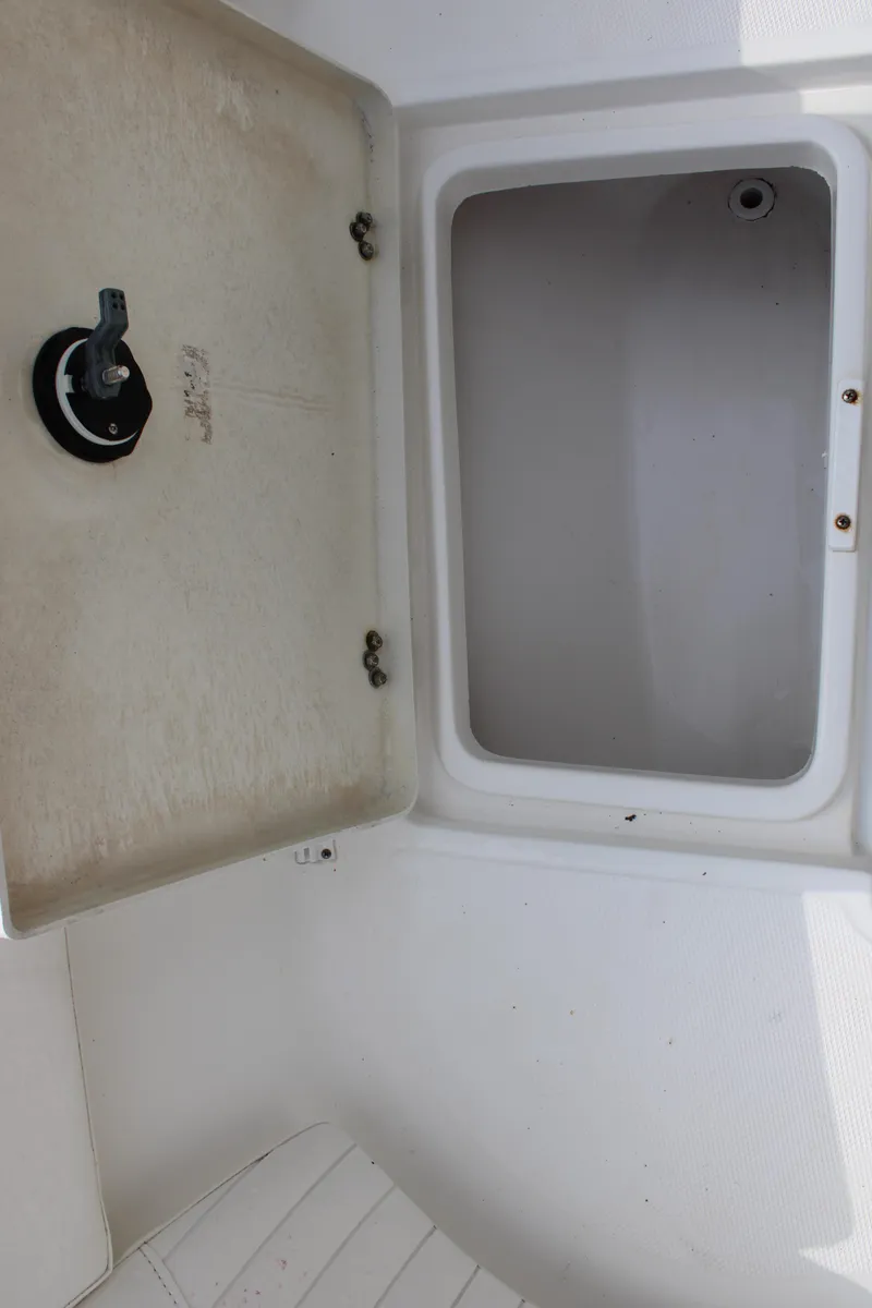 Slide: The Image of Open storage compartment on 2009 Sea Fox 256CC Pro Series boat. - 19